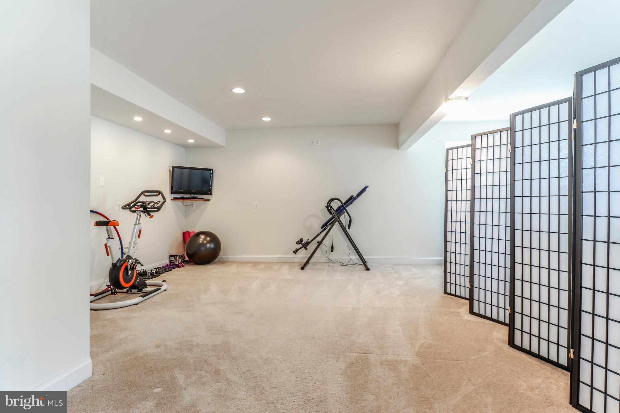 11151 Rawhide Road Lusby, MD 20657 - Photo 27 of 35 Lower level is open BUT sectioned off for work out