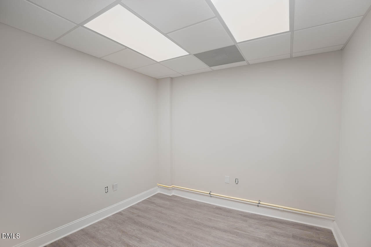 5621 Departure Drive, Unit 101 Raleigh, NC 27616 - Photo 11 of 17 a view of an empty room