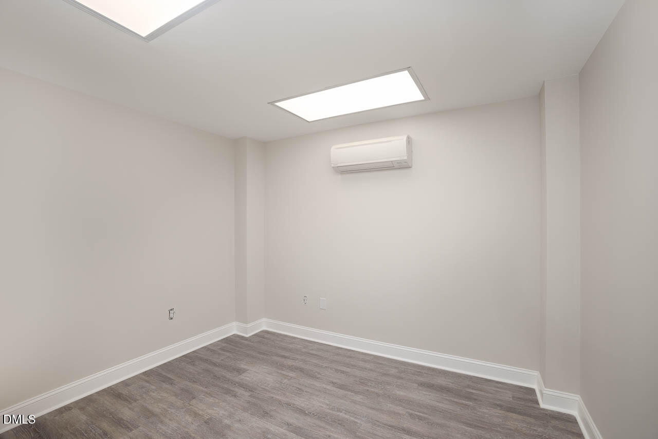 5621 Departure Drive, Unit 101 Raleigh, NC 27616 - Photo 8 of 17 a view of an empty room