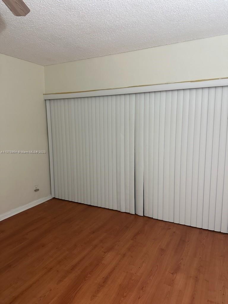 Inverrary Lauderhill, FL 33319 - Photo 3 of 11 a view of an empty room with wooden floor
