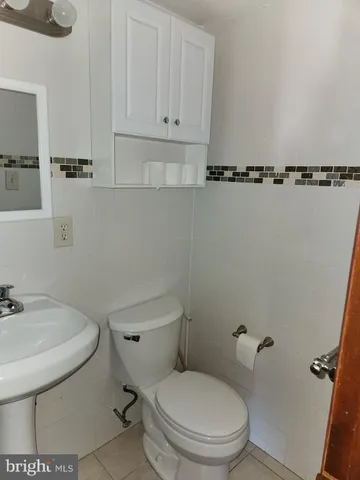 a bathroom with a shower and a bathtub