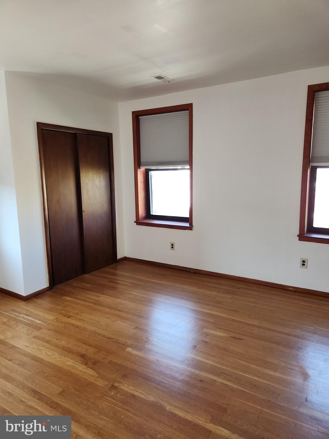 746 South Street Philadelphia, PA 19147 - Photo 15 of 18 a view of an empty room with wooden floor and a window