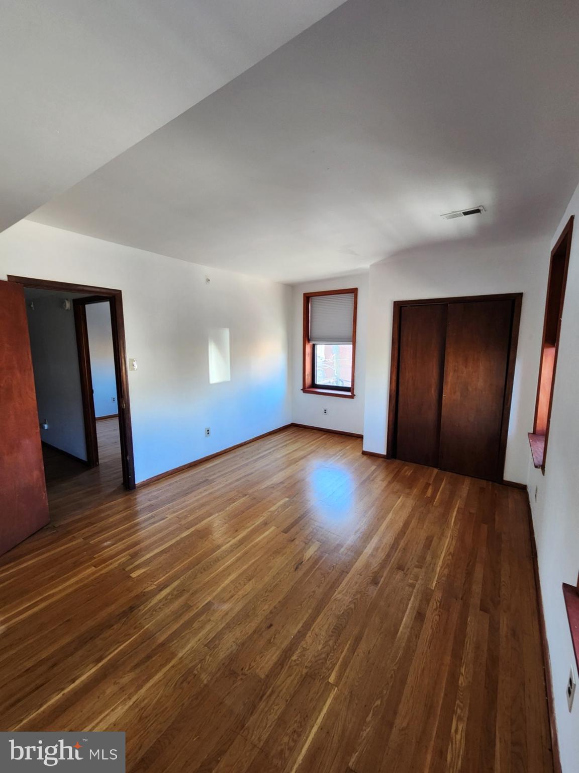 746 South Street Philadelphia, PA 19147 - Photo 18 of 18 wooden floor in an empty room with a window