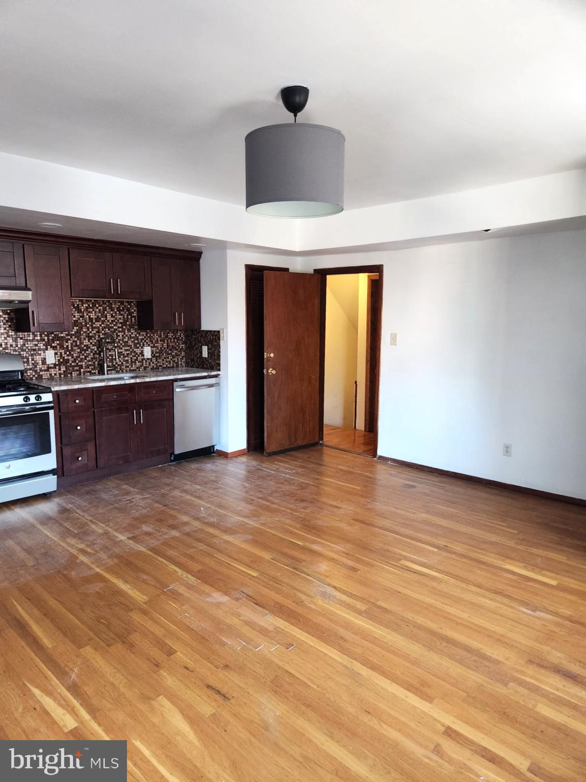 746 South Street Philadelphia, PA 19147 - Photo 8 of 18 a view of an empty room with window and wooden floor