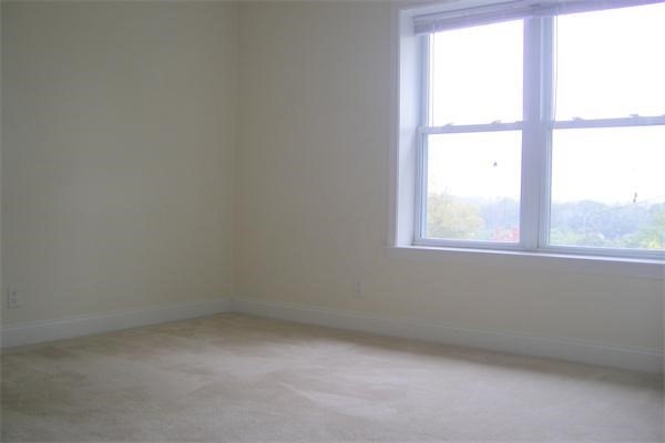 152 Newton Street, Unit 6 Boston, MA 02135 - Photo 11 of 17 an empty room with a window