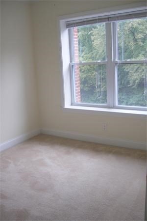 152 Newton Street, Unit 6 Boston, MA 02135 - Photo 13 of 17 an empty room with a window