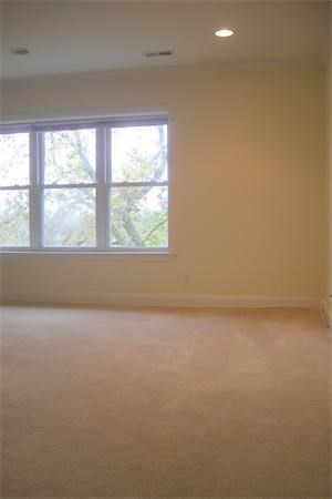 152 Newton Street, Unit 6 Boston, MA 02135 - Photo 9 of 17 an empty room with a window