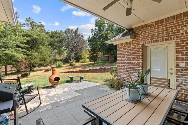 an outdoor space with furniture
