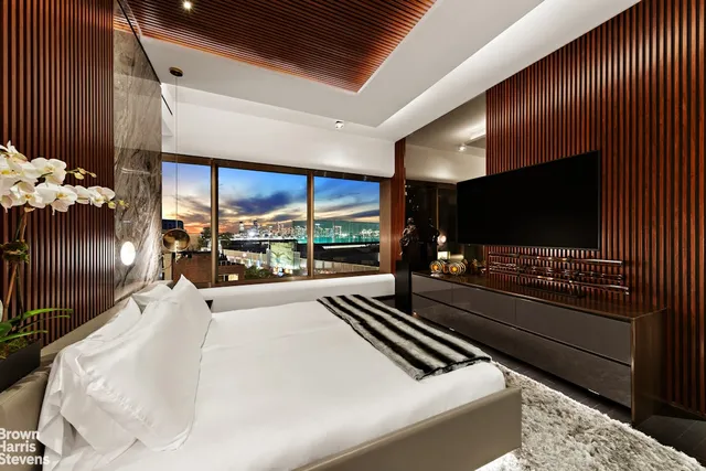 a bathroom with a tub and a window