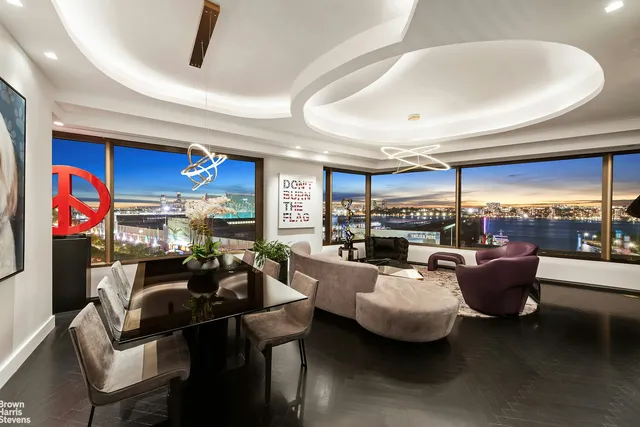 a room with furniture and flat screen tv