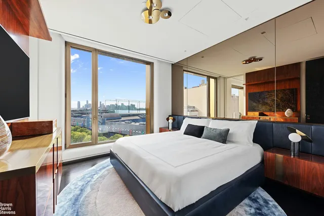 a living room with large windows