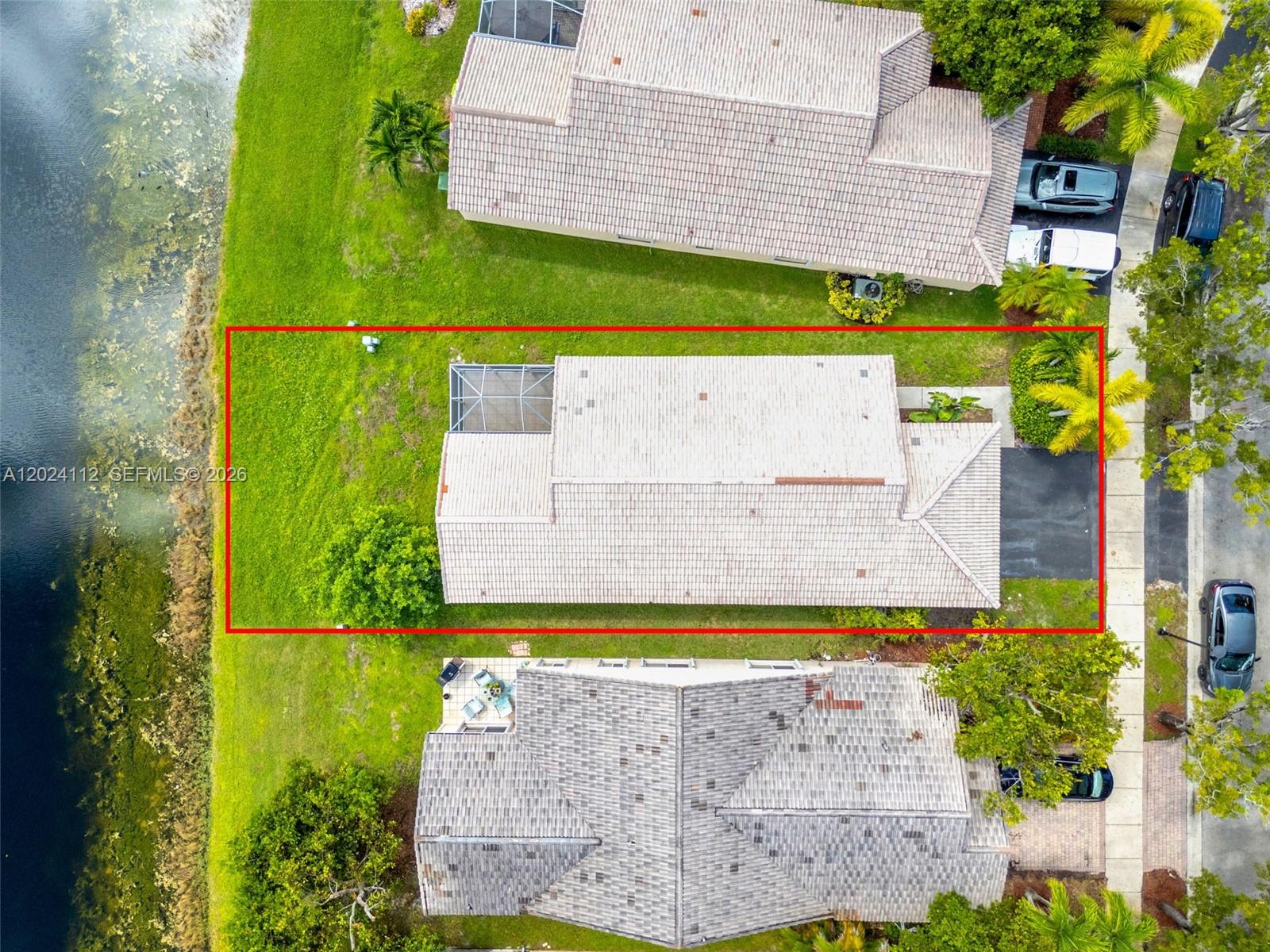4366 Mahogany Ridge Drive Weston, FL 33331 - Photo 33 of 41 an aerial view of a house with a garden