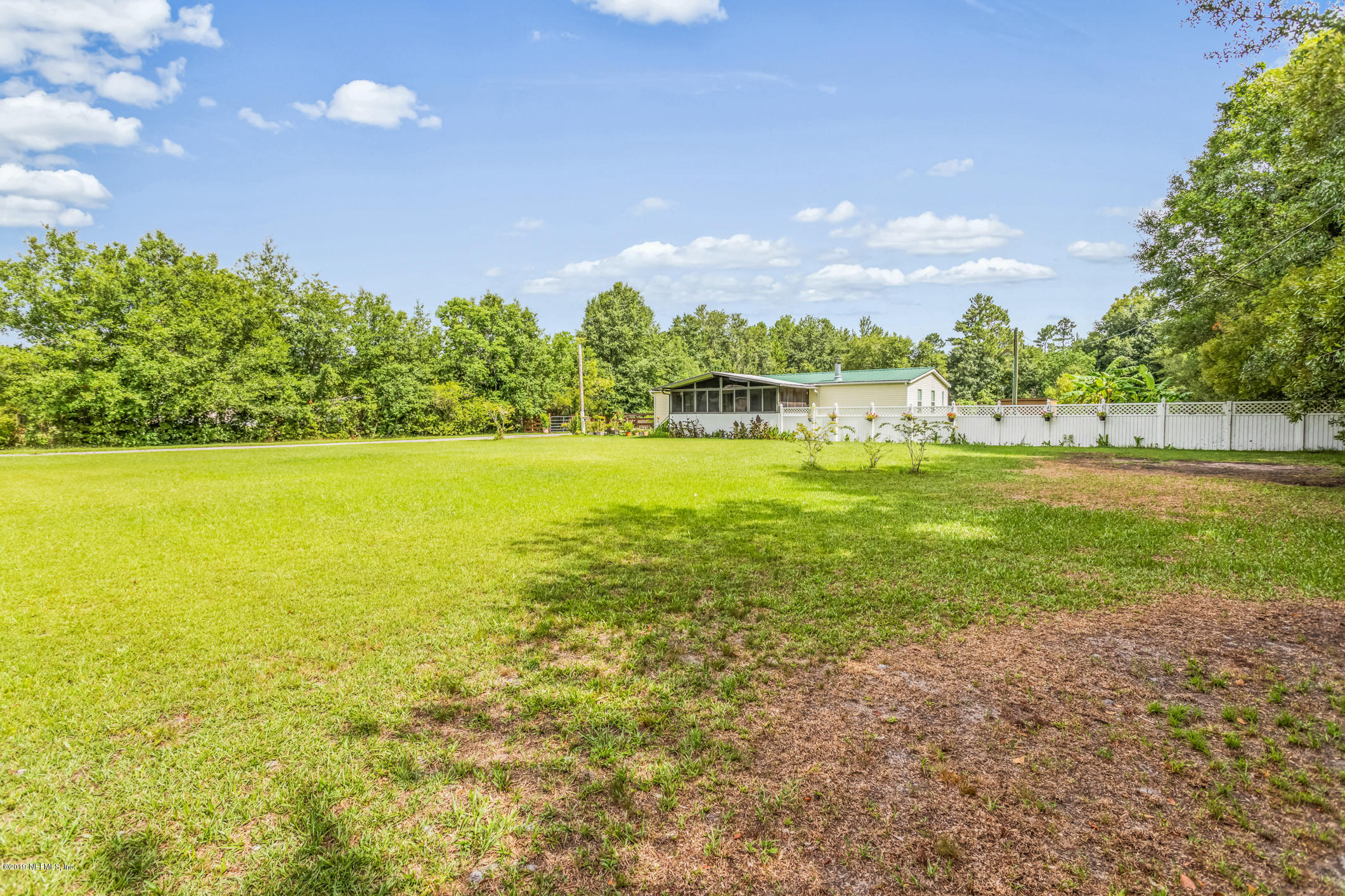 15801 Dusty Road Jacksonville, FL 32234 - Photo 2 of 69 Front & Side From Street