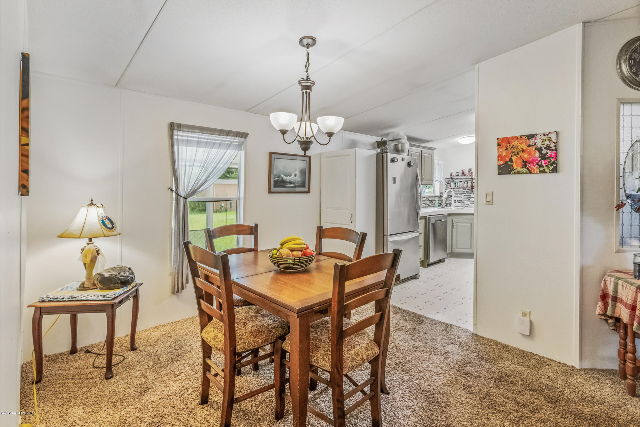 15801 Dusty Road Jacksonville, FL 32234 - Photo 23 of 69 Dining Room To Kitchen