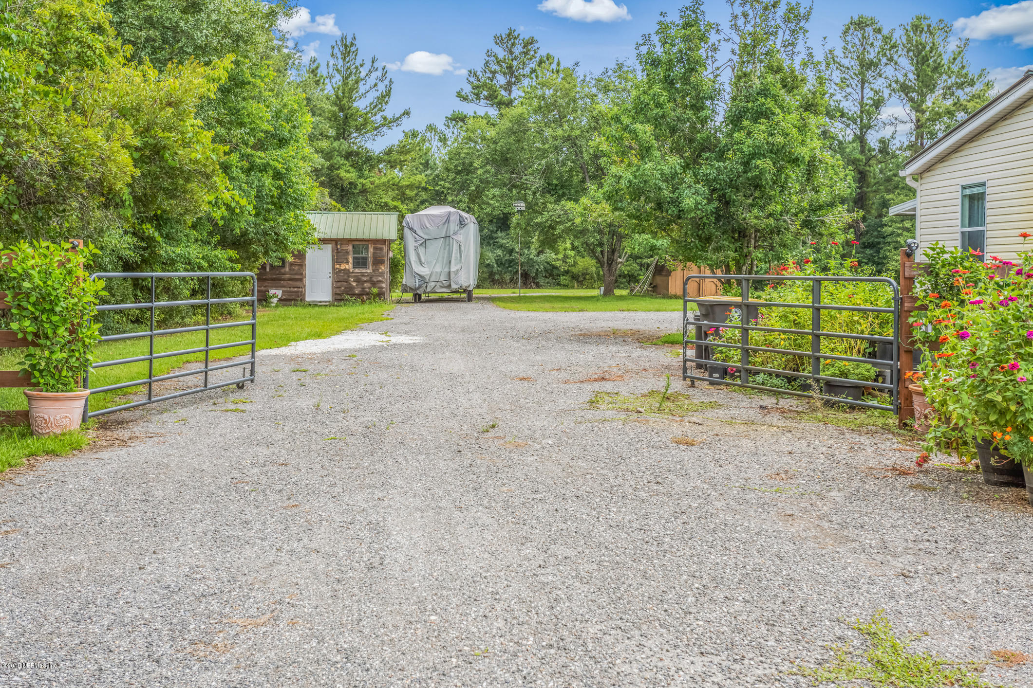 15801 Dusty Road Jacksonville, FL 32234 - Photo 40 of 69 Gate To Back Driveway