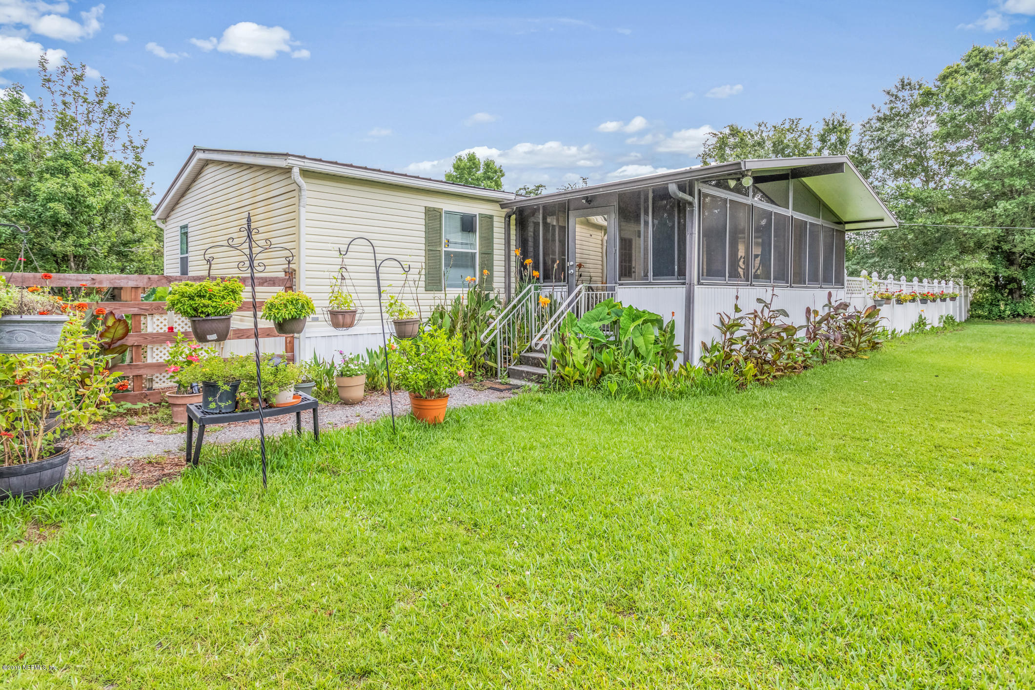 15801 Dusty Road Jacksonville, FL 32234 - Photo 6 of 69 Front & Side View