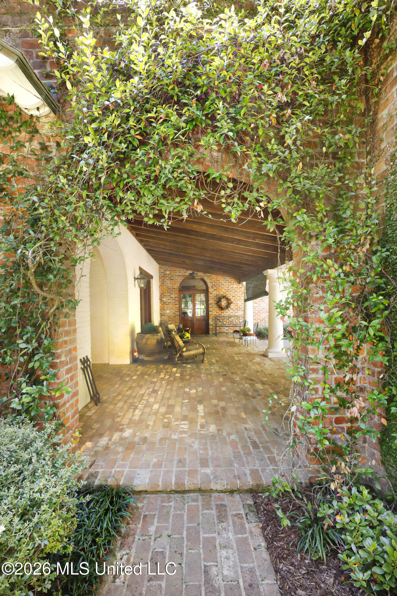 657 Zetus Road Northeast Brookhaven, MS 39601 - Photo 23 of 80 657 breezeway veranda entrance
