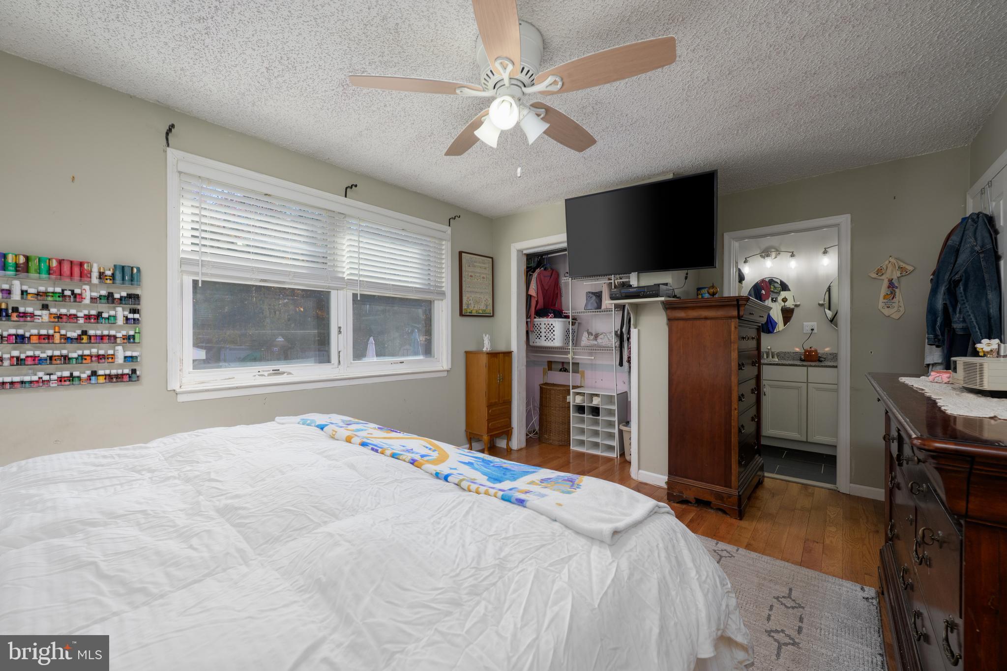 28 Mary Ellen Lane Sicklerville, NJ 08081 - Photo 15 of 46 a bedroom with a bed and a flat screen tv
