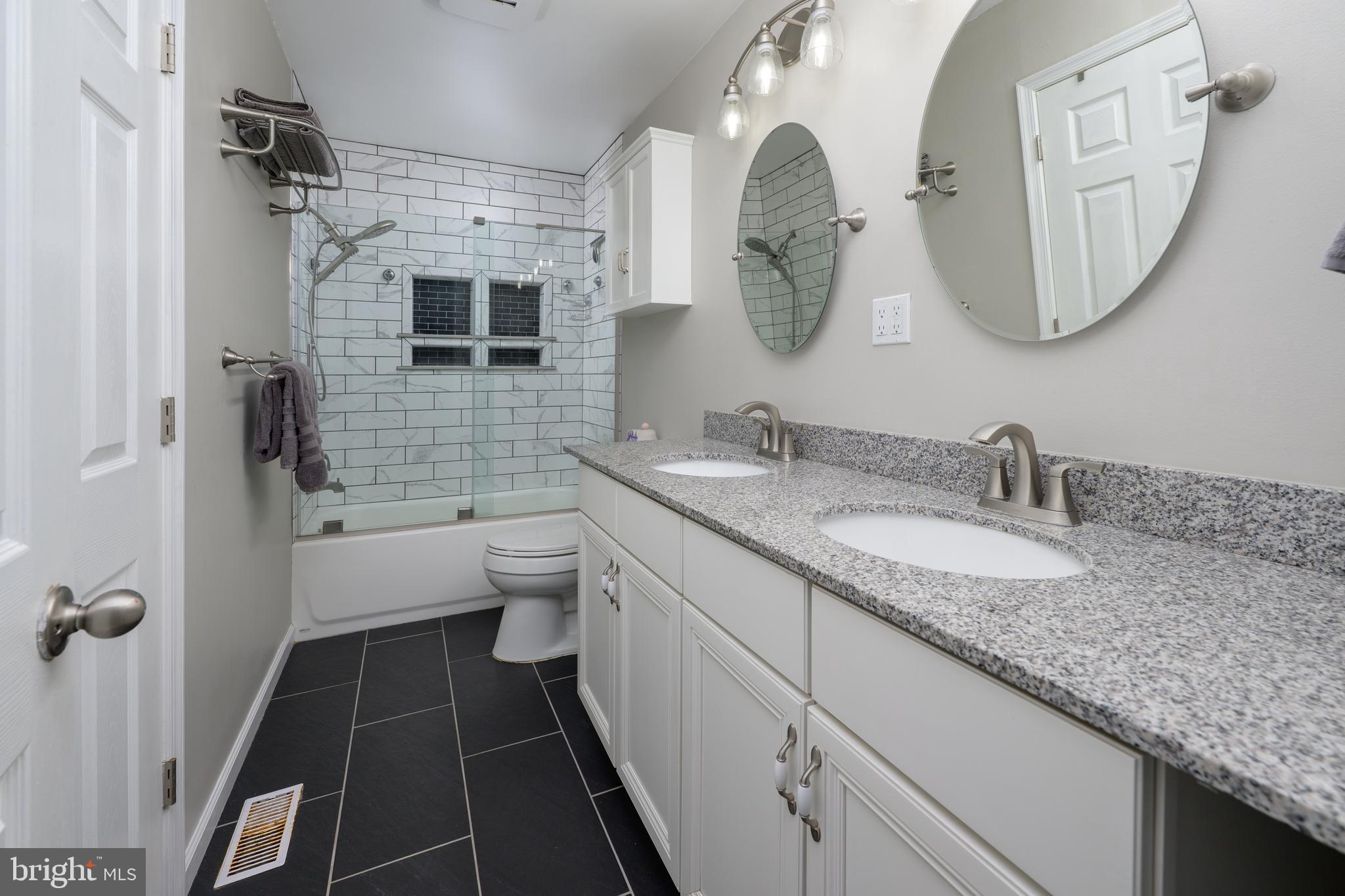 28 Mary Ellen Lane Sicklerville, NJ 08081 - Photo 16 of 46 a bathroom with a granite countertop sink mirror and toilet