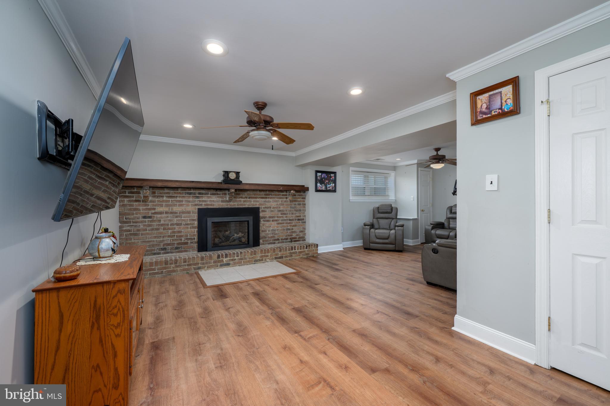 28 Mary Ellen Lane Sicklerville, NJ 08081 - Photo 20 of 46 a living room with furniture and a fireplace