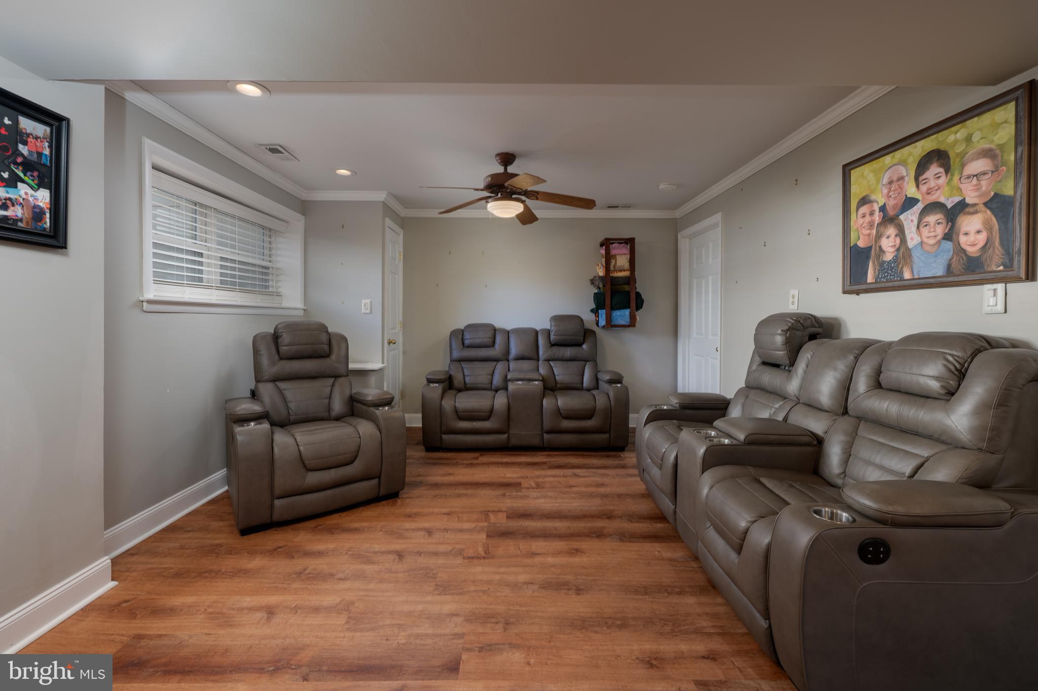 28 Mary Ellen Lane Sicklerville, NJ 08081 - Photo 22 of 46 a living room with furniture a ceiling fan and a rug
