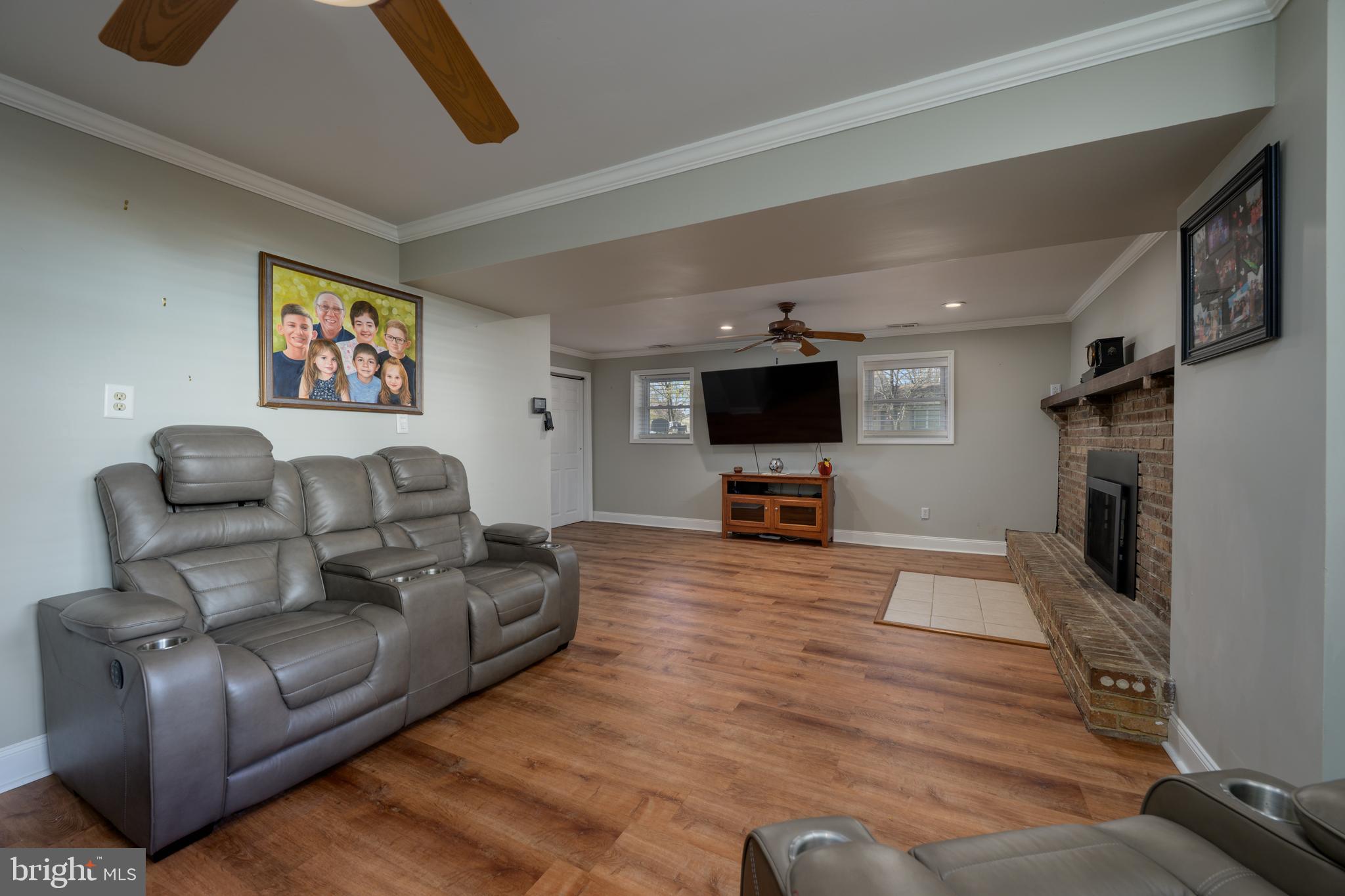 28 Mary Ellen Lane Sicklerville, NJ 08081 - Photo 23 of 46 a living room with furniture and a flat screen tv