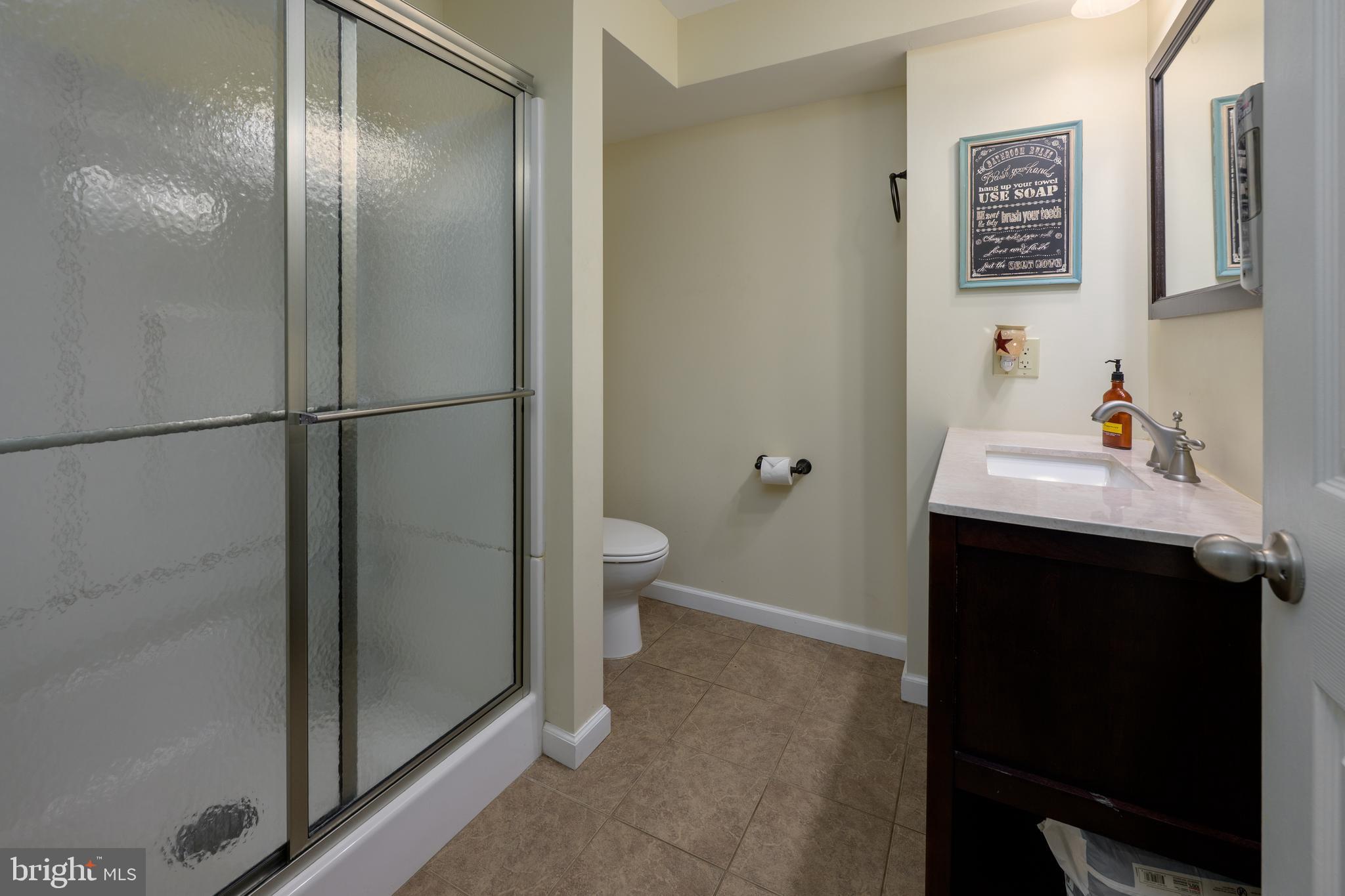 28 Mary Ellen Lane Sicklerville, NJ 08081 - Photo 24 of 46 a bathroom with a sink and a toilet