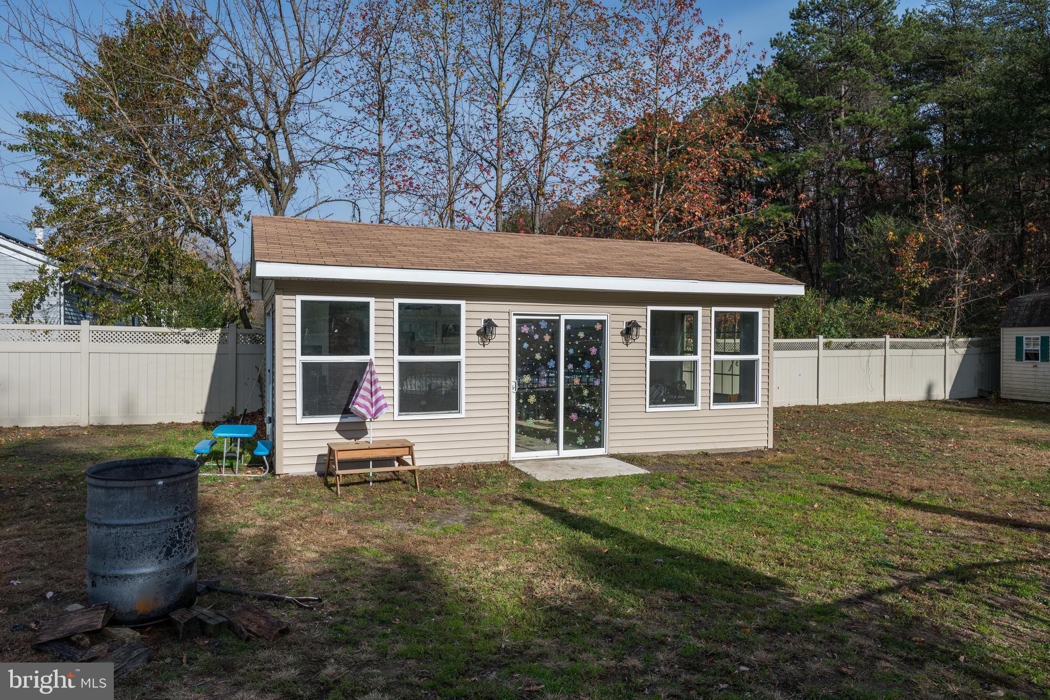 28 Mary Ellen Lane Sicklerville, NJ 08081 - Photo 34 of 46 a front view of a house with a garden