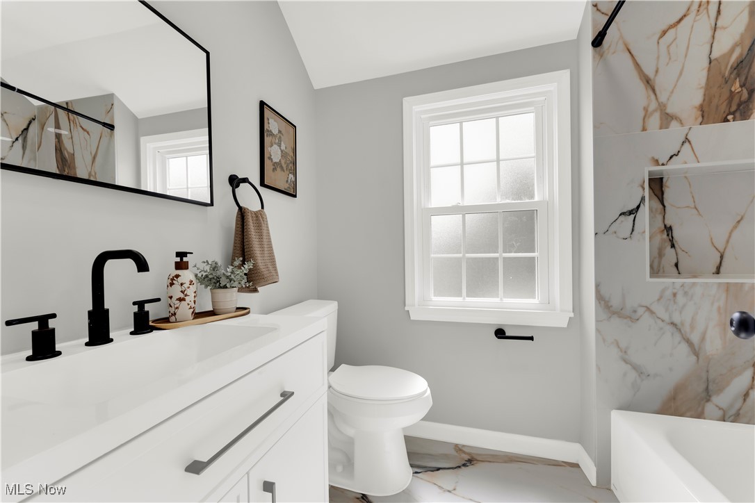 3964 Navahoe Road Cleveland Heights, OH 44121 - Photo 23 of 30 Full bathroom with marble finish floor, toilet, vanity, and a marble finish shower