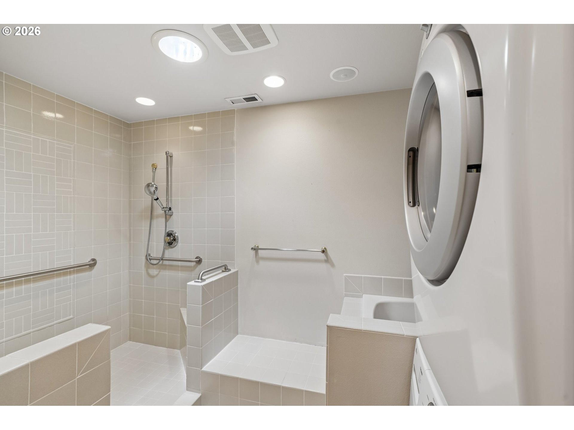 7600 Southwest Northvale Way Portland, OR 97225 - Photo 24 of 46 a bathroom with a toilet sink and mirror
