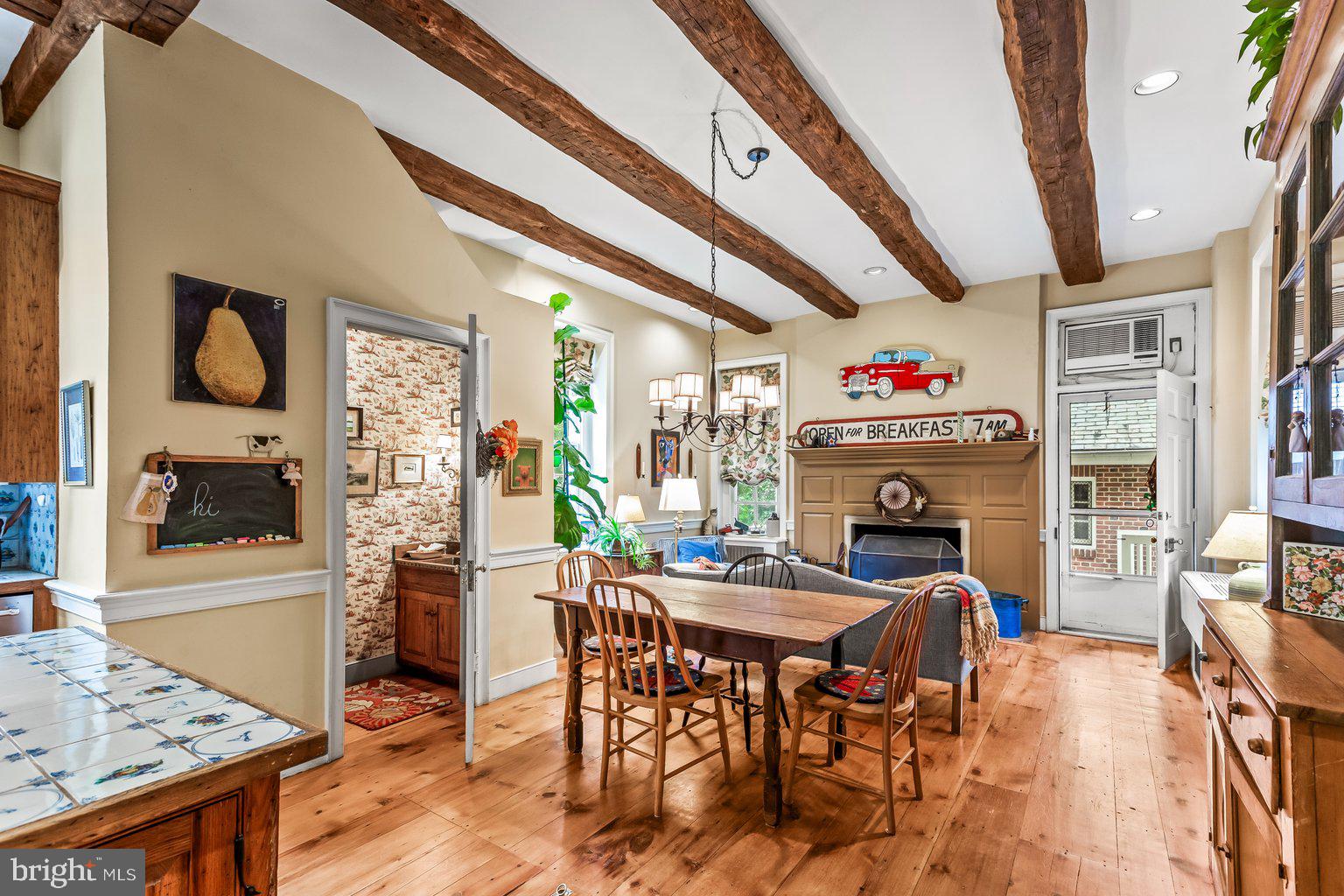 300 Somerset Road Baltimore, MD 21210 - Photo 16 of 48 Living space with fireplace off kitchen