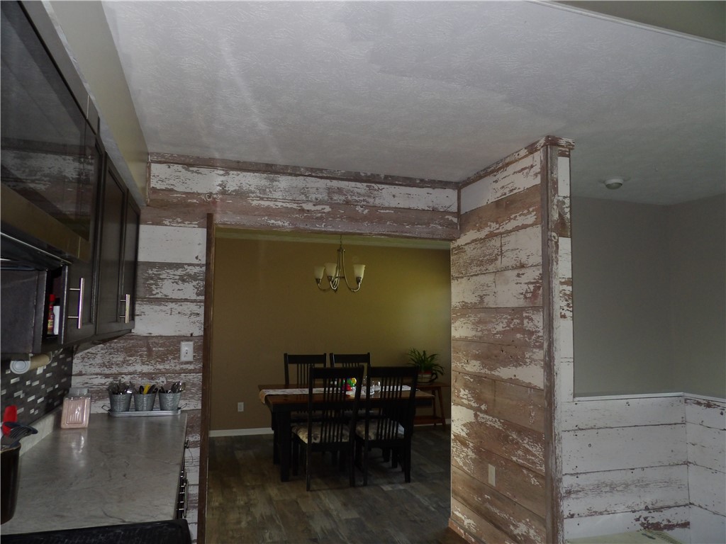 4505 North Alcony Conover Road Conover, OH 45317 - Photo 64 of 64 Rustic charm defines this inviting dining area, perfect for intimate gatherings.