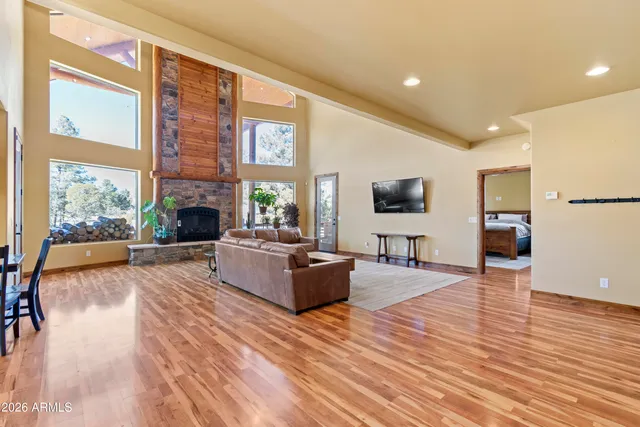 a large kitchen with stainless steel appliances granite countertop a large center island and a sink