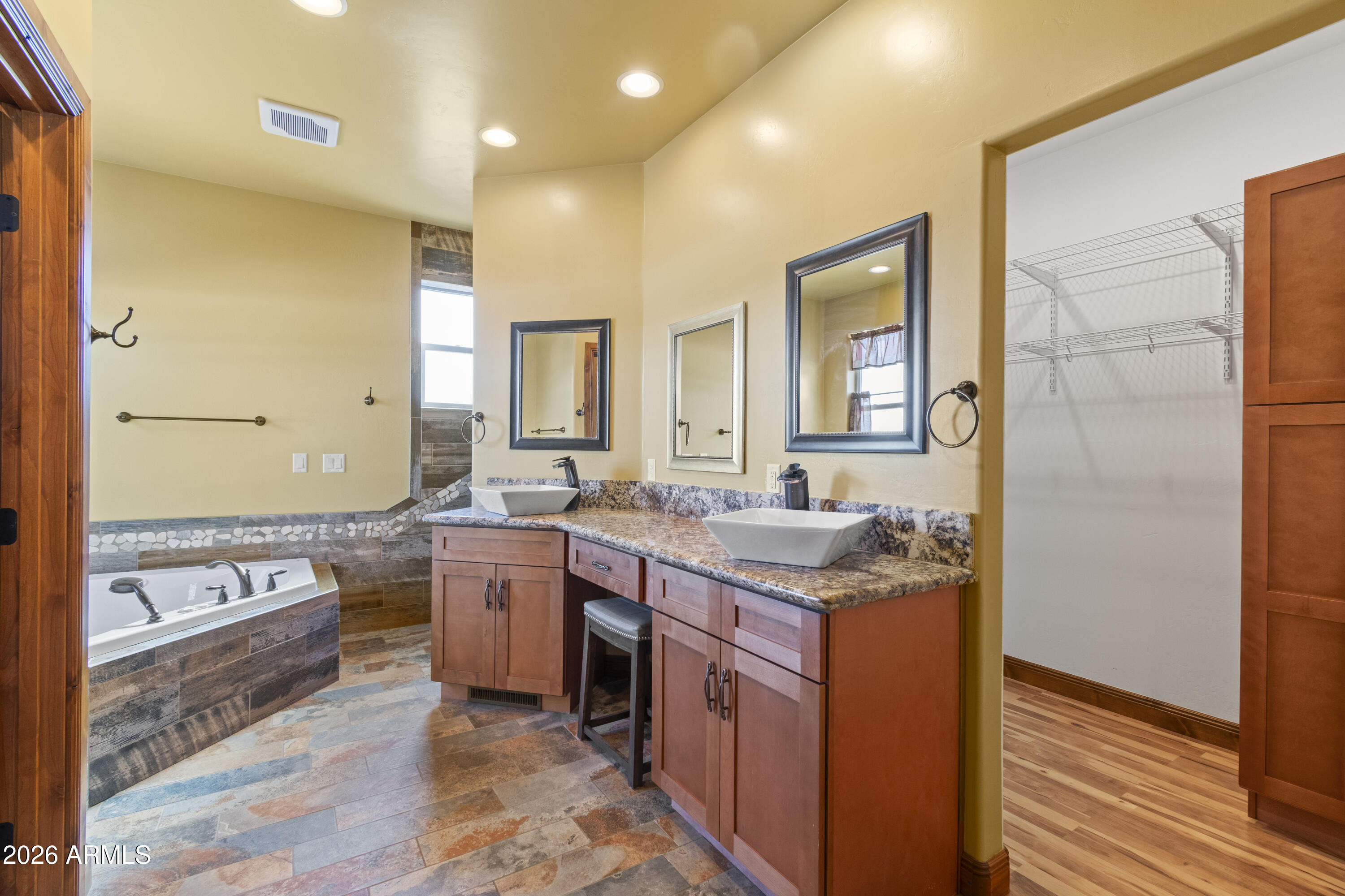 816 Fern Way Show Low, AZ 85901 - Photo 27 of 93 a kitchen with a sink stove and cabinets