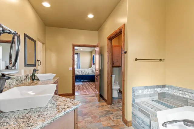 a living room with a couch and a rug