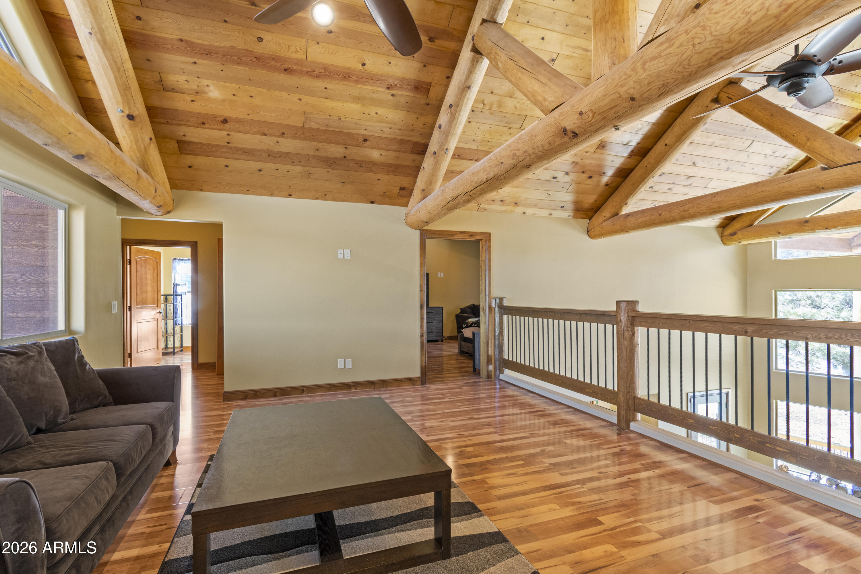 816 Fern Way Show Low, AZ 85901 - Photo 37 of 88 a living room with a couch and a rug