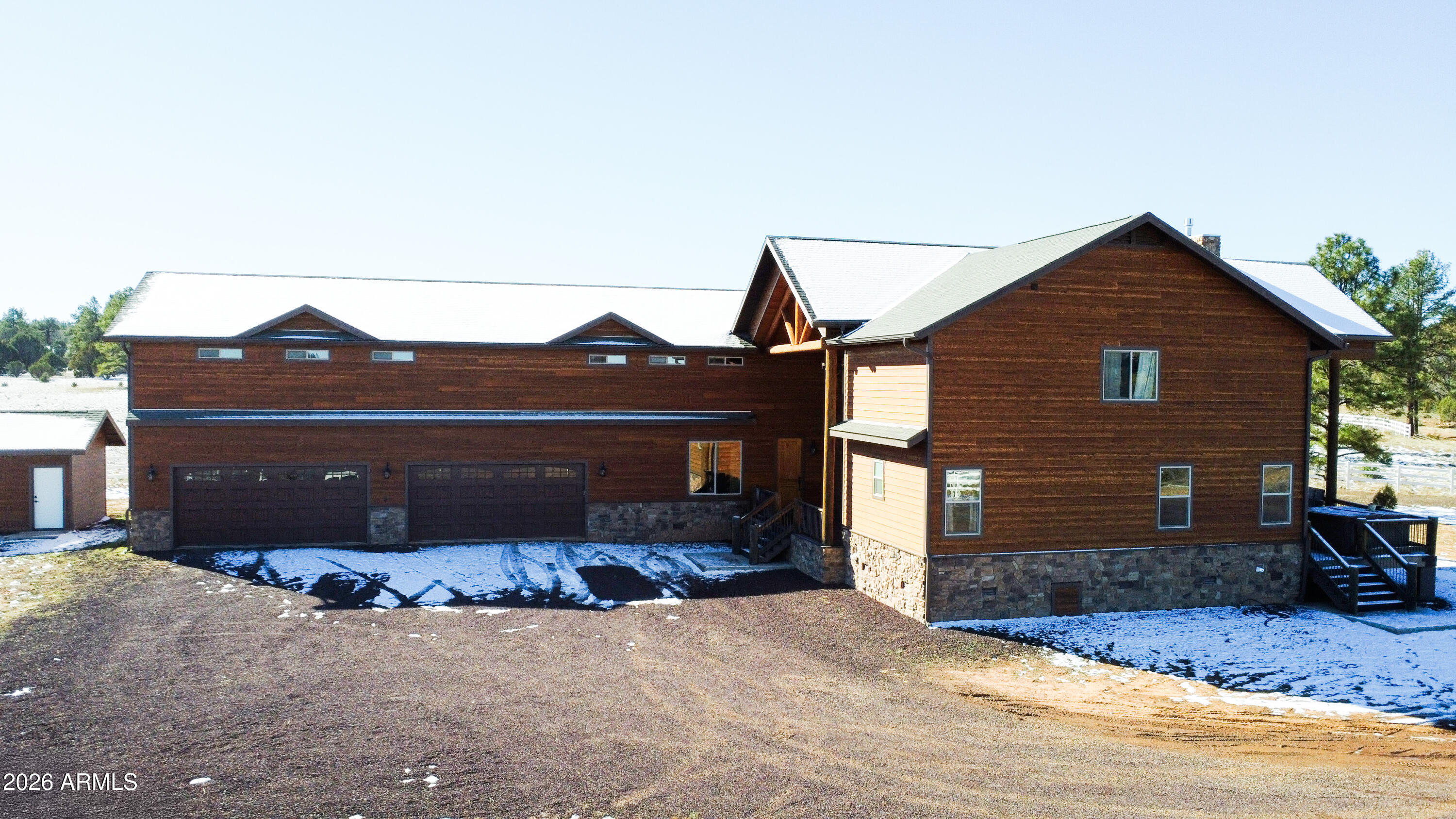 816 Fern Way Show Low, AZ 85901 - Photo 3 of 88 a front view of a house with a yard
