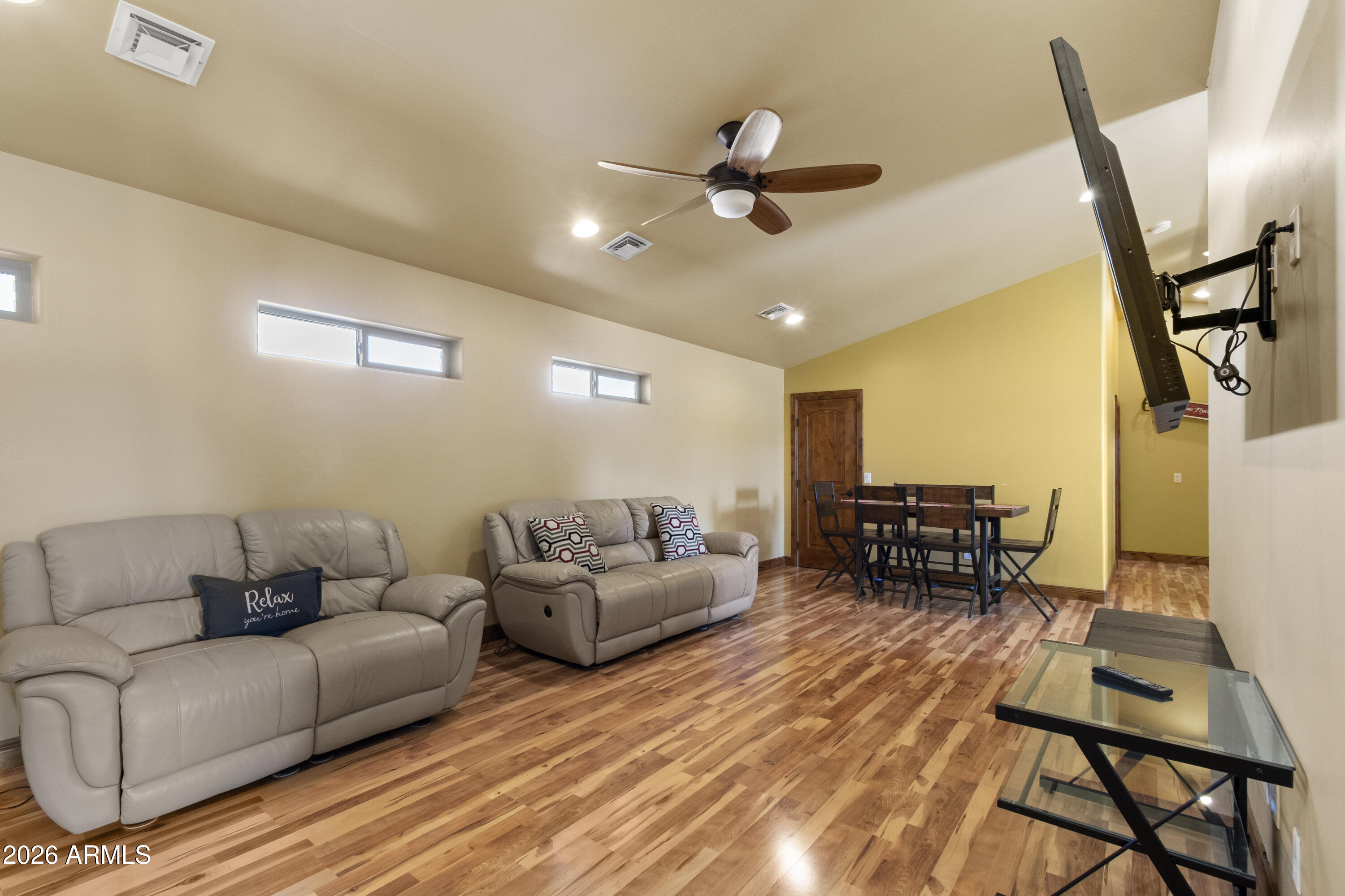 816 Fern Way Show Low, AZ 85901 - Photo 47 of 88 a living room with furniture and a wooden floor