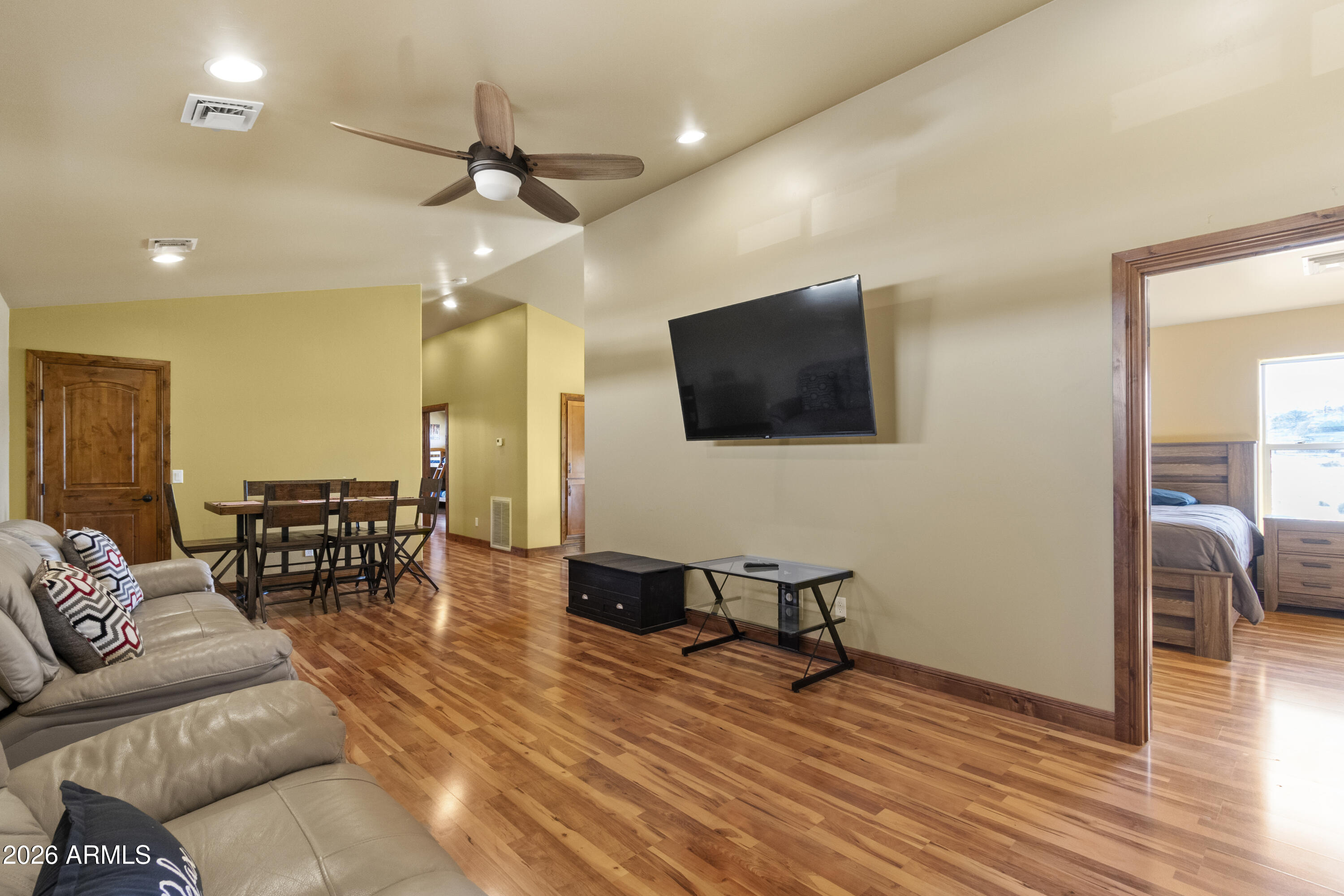 816 Fern Way Show Low, AZ 85901 - Photo 51 of 93 a living room with furniture and a flat screen tv