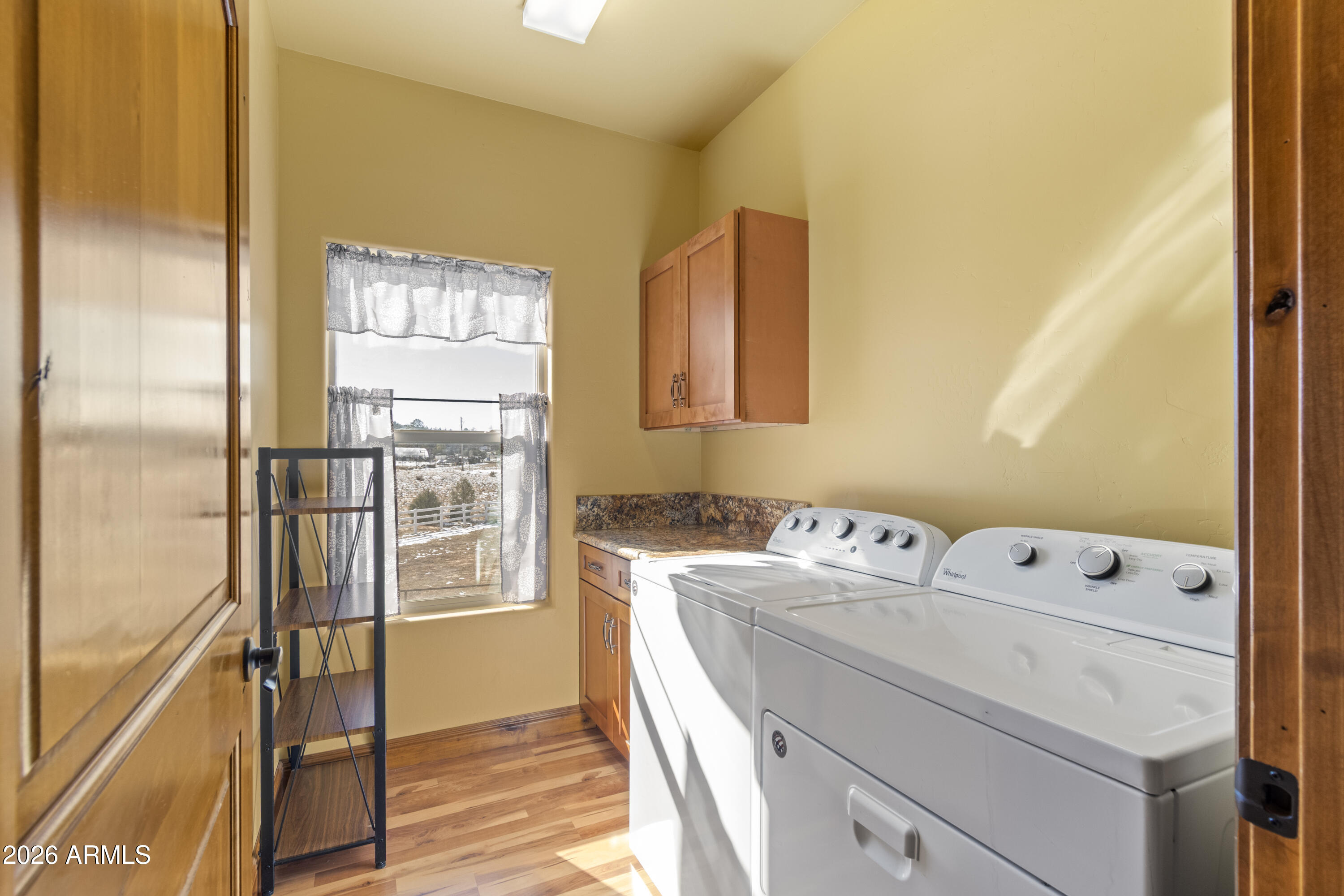 816 Fern Way Show Low, AZ 85901 - Photo 52 of 93 a utility room with dryer and washer