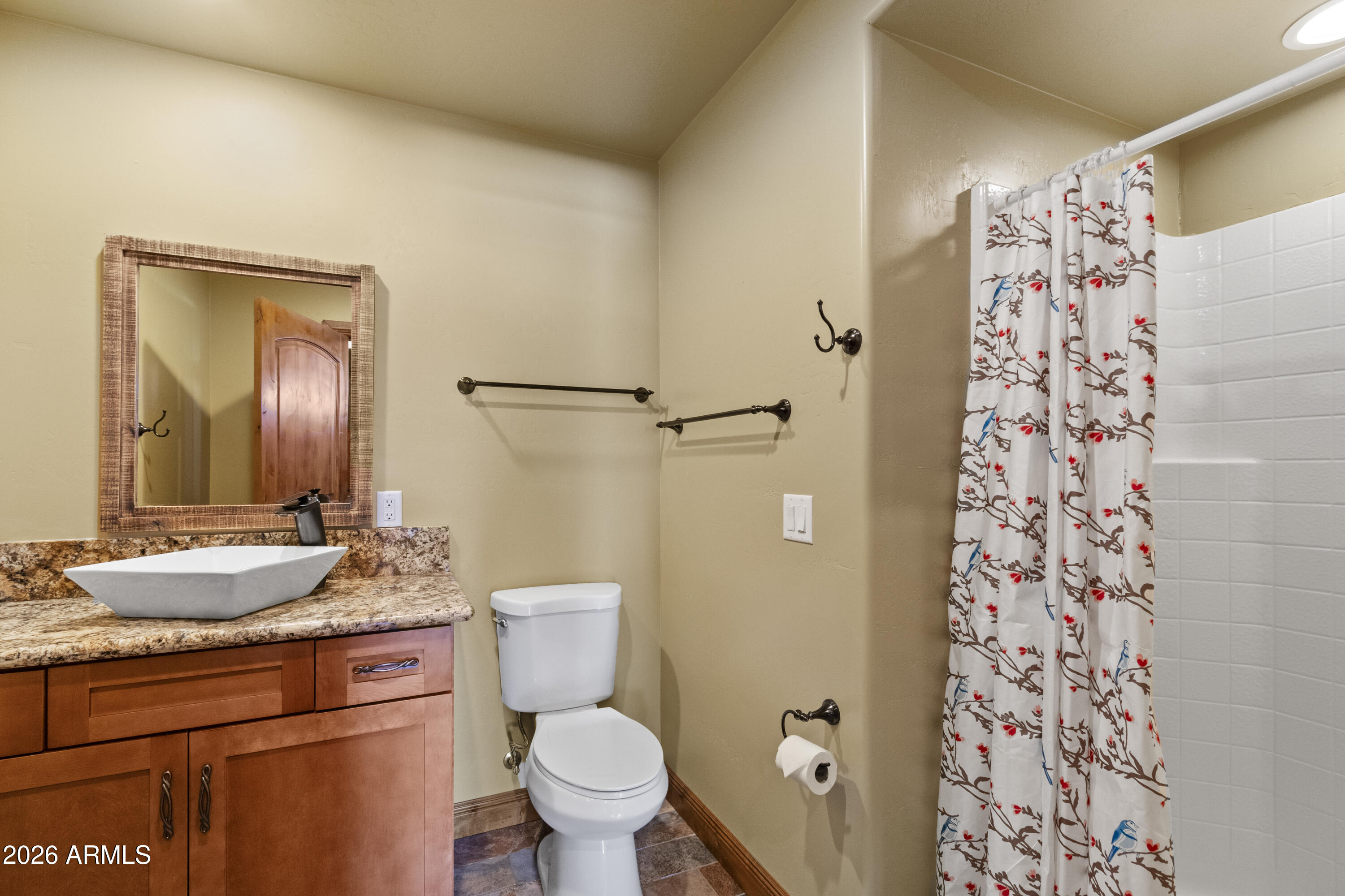 816 Fern Way Show Low, AZ 85901 - Photo 67 of 88 a bathroom with a granite countertop sink toilet and shower