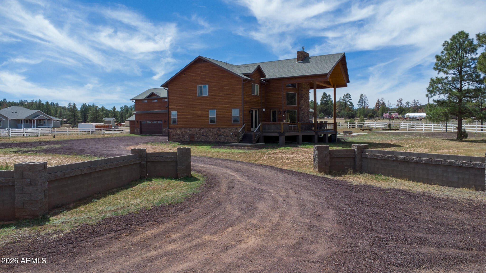 816 Fern Way Show Low, AZ 85901 - Photo 7 of 93 a front view of a house with garden