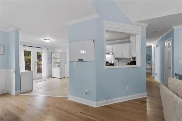 a view of a kitchen cabinets and wooden floor