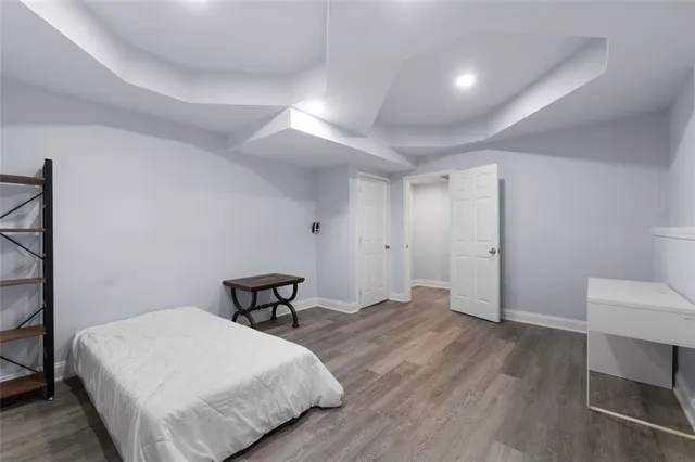 a view of a park with large trees