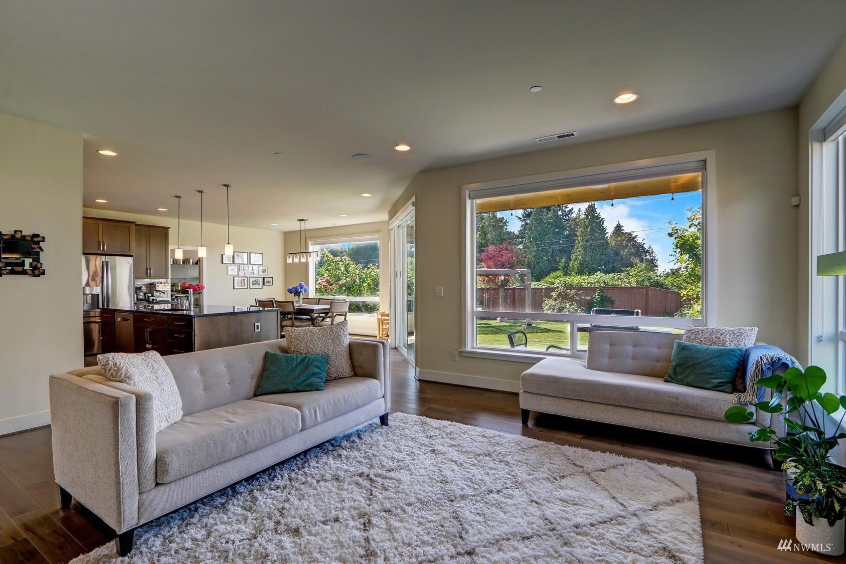 4321 231st Place Southeast Bothell, WA 98021 - Photo 13 of 40 a living room with furniture and a large window