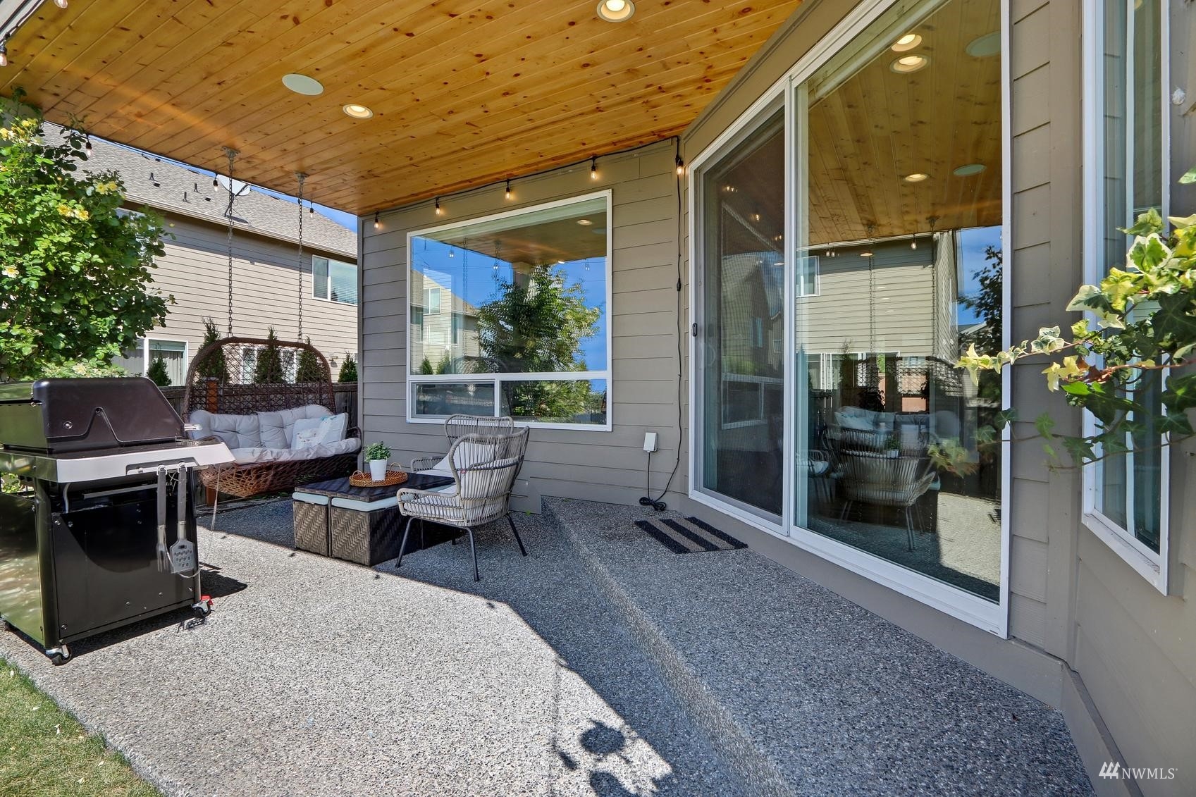 4321 231st Place Southeast Bothell, WA 98021 - Photo 15 of 40 a building outdoor space with patio furniture and potted plants