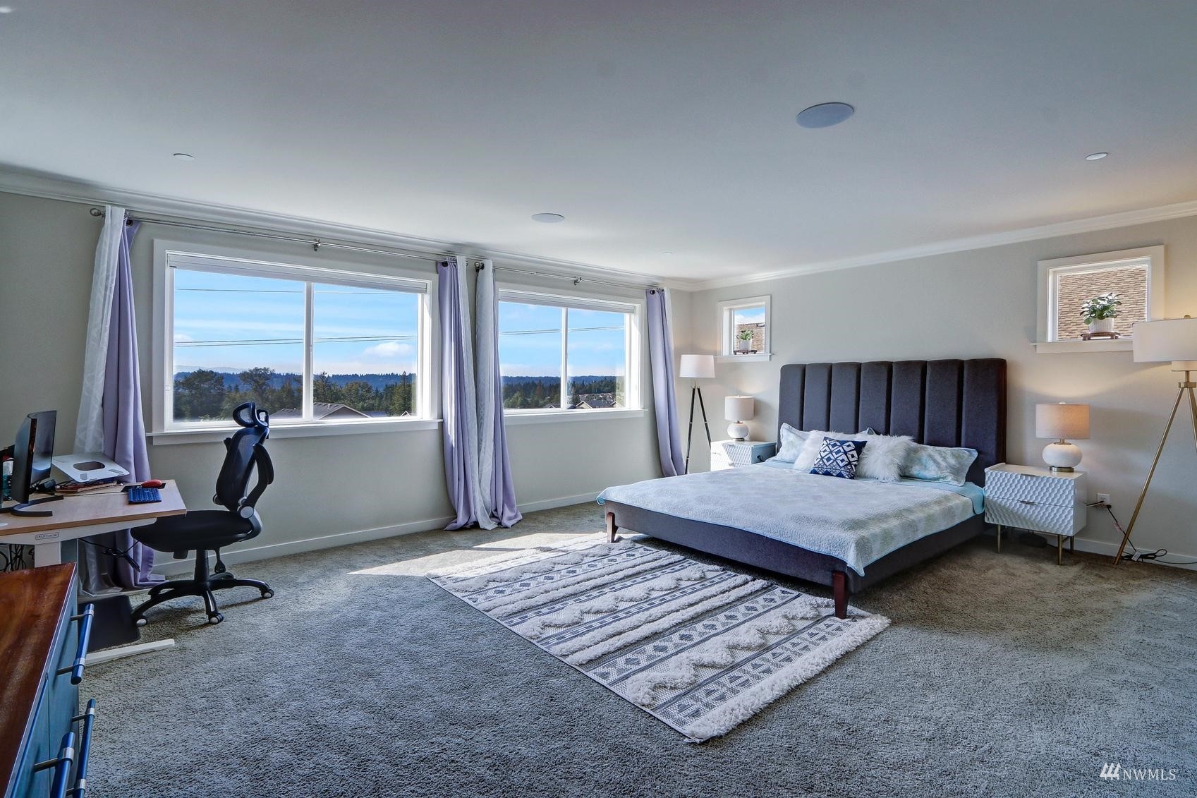 4321 231st Place Southeast Bothell, WA 98021 - Photo 18 of 40 a bedroom with a large bed and a window
