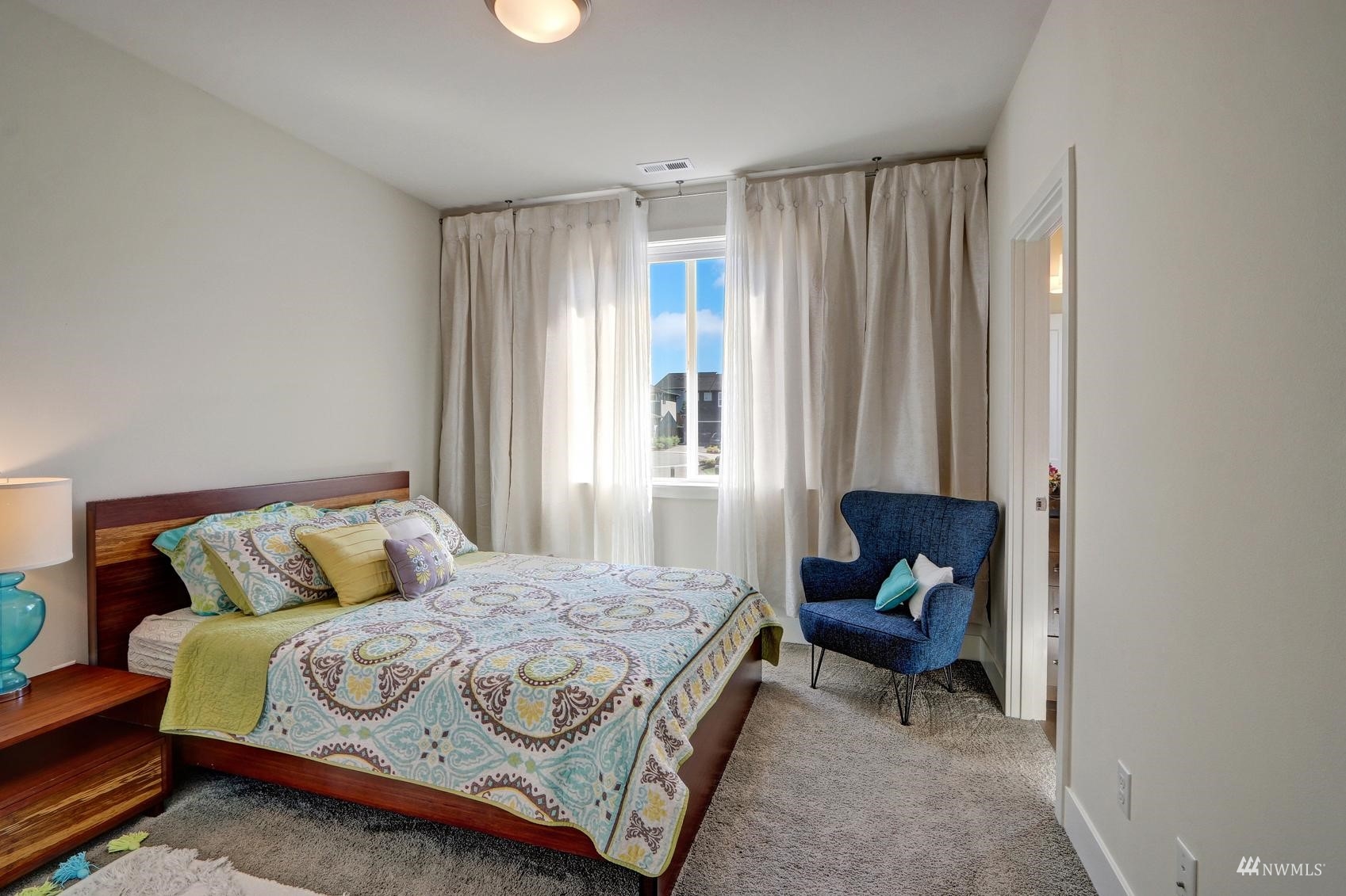 4321 231st Place Southeast Bothell, WA 98021 - Photo 26 of 40 a bedroom with a bed and a window