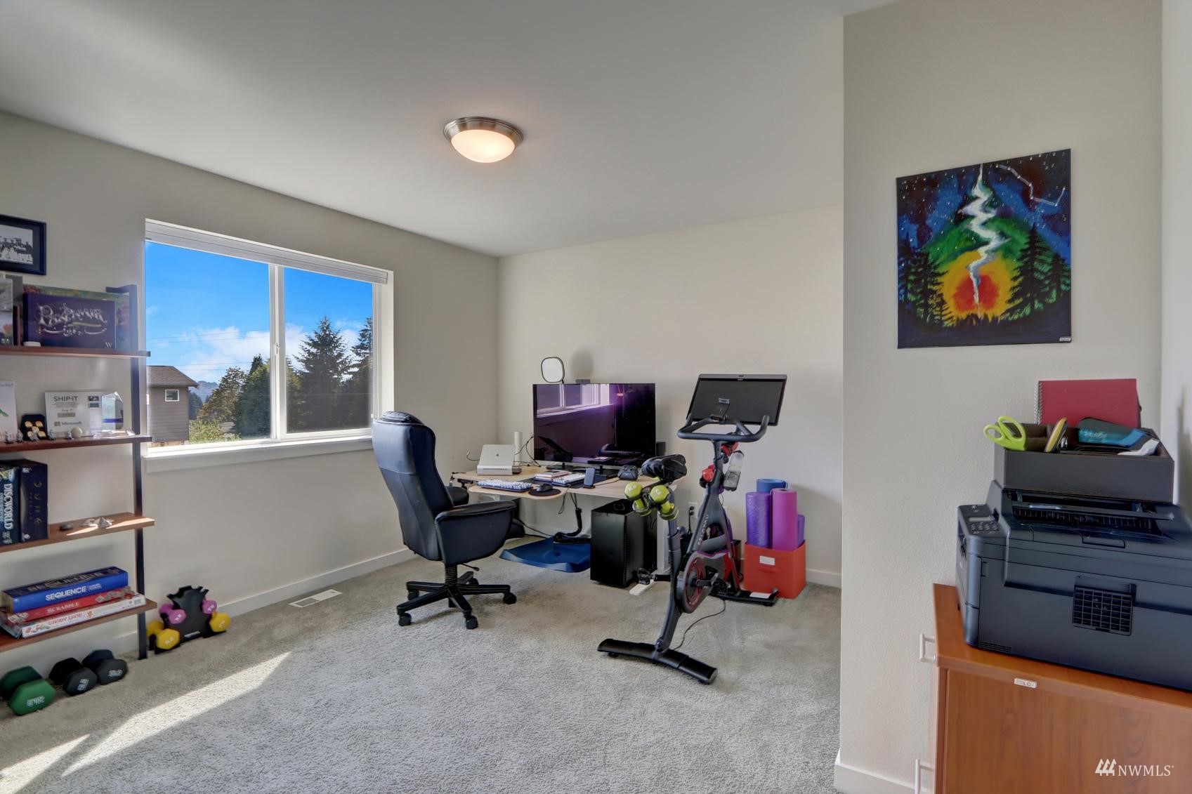 4321 231st Place Southeast Bothell, WA 98021 - Photo 29 of 40 a view of a workspace with furniture and a window