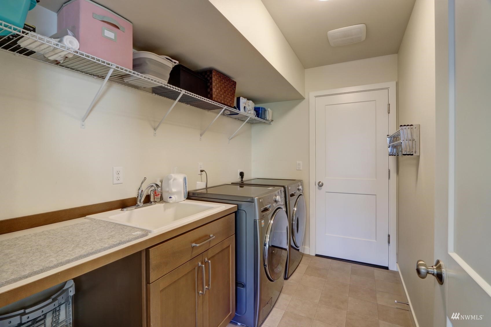 4321 231st Place Southeast Bothell, WA 98021 - Photo 33 of 40 a utility room with dryer and washer